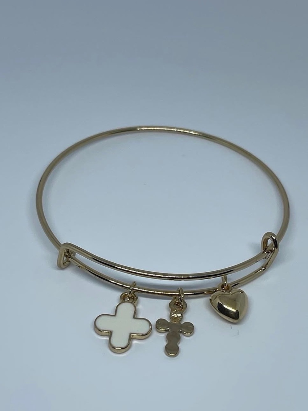 Gold Tone Charm Bangle Bracelet with White Cross & Heart